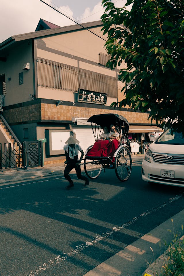 Hands arranged in a unity circle on a wood deck, representing teamwork and group travel